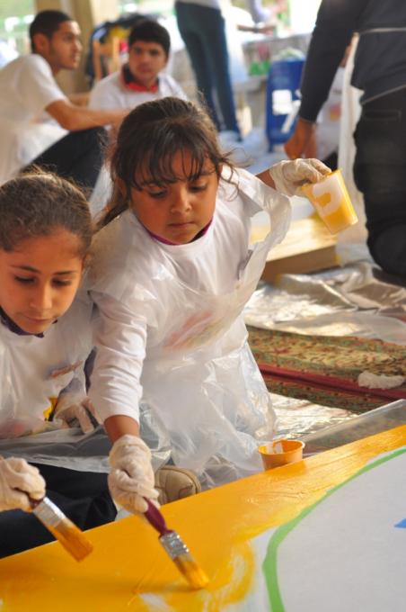 Children painting a brighter future at a Save the Children art workshop, as part of Save the Children’s Safer Environment for Children project funded by the Italian Egyptian Debt Swap for Development Programme